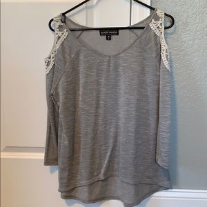 Half sleeve shirt with hole on shoulder